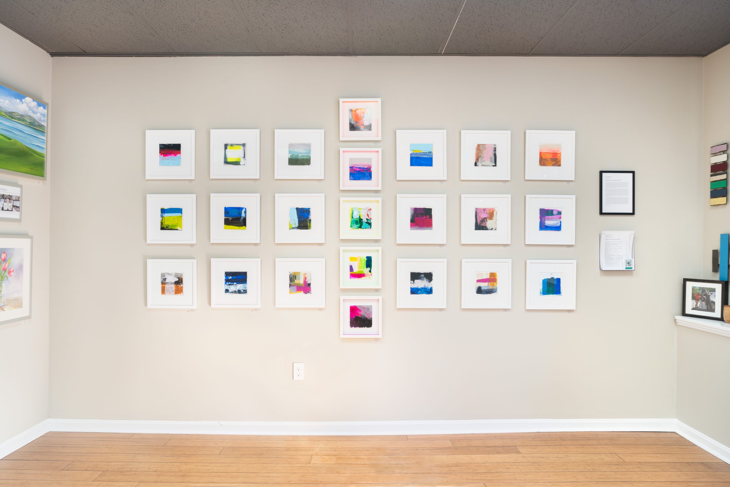 Art on the wall, titled Playing with Sound and Color by Dina Brennan